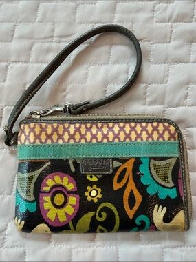 Fossil Key-Per Zip Around Wristlet with a multicolored floral and birdie design